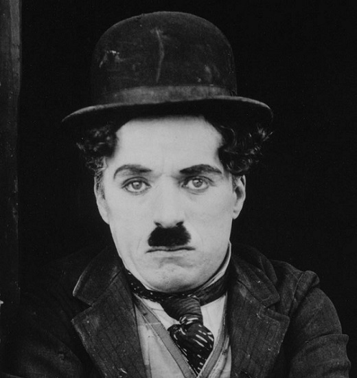 a black and white image of charlie chaplin